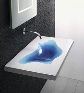 5-A-Gorgeous-Minimalistic-Irregular-Shaped-Sink-in-White-by-Catalano-Takes-on-Extra-Character-with-The-Incorporation-of-A-Blue-Splash-Shaped-Hollow