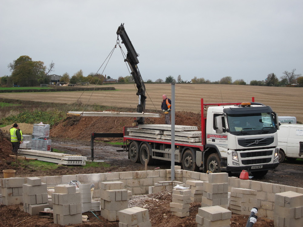 Concrete beams for ground floor being delivered