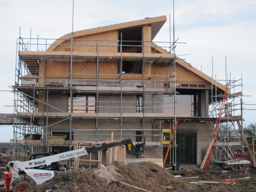 No glass in the top-floor window on the west side