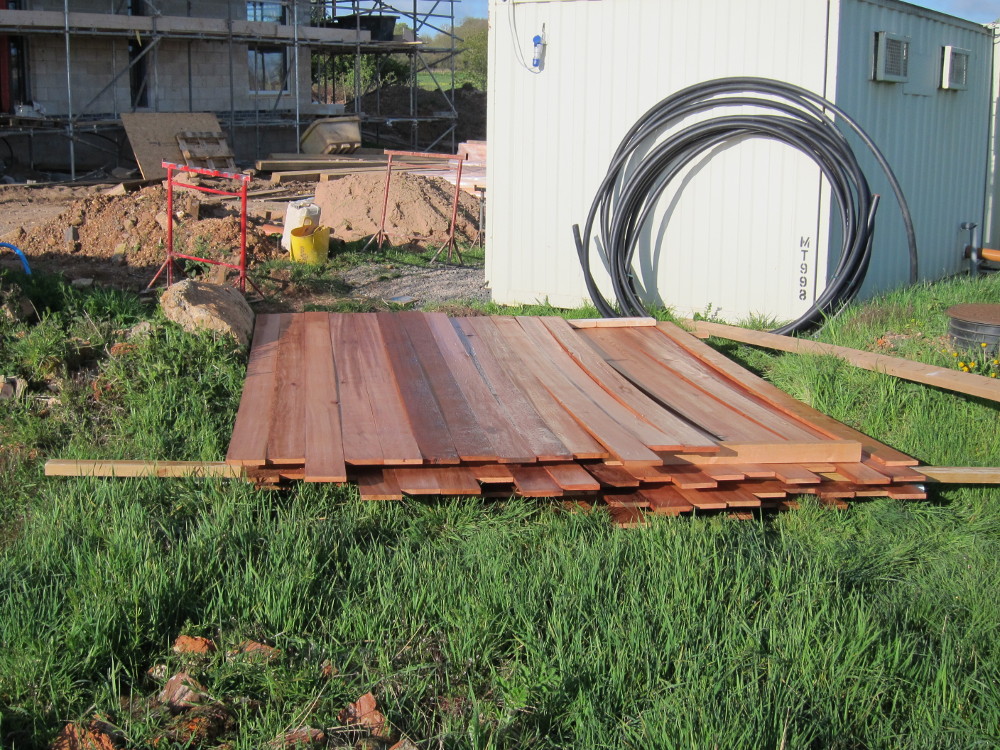 Western Red Cedar timber cladding being prepared for installation