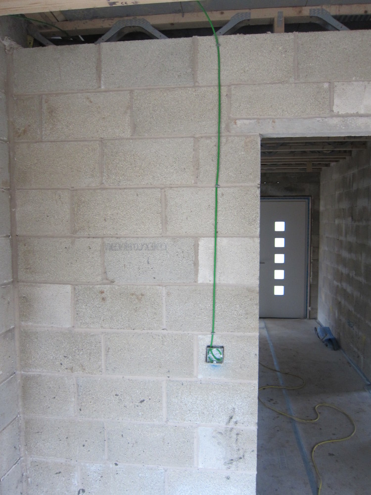 One of the light switches, wired using green KNX cable