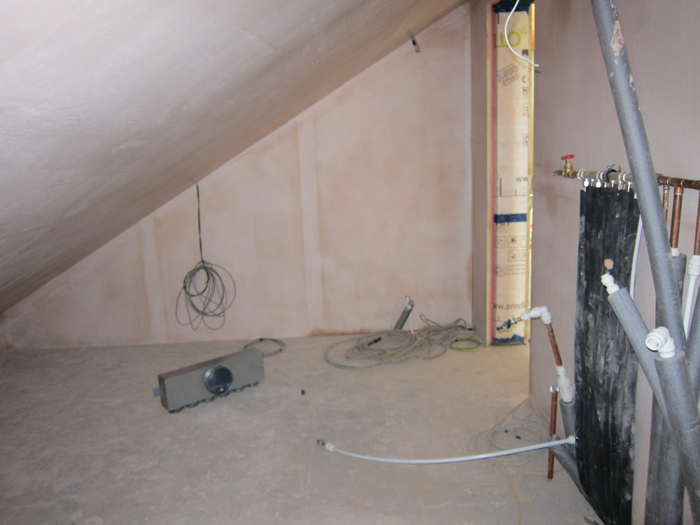 Skim coat of plaster over the FireLine boards in the Plant Room