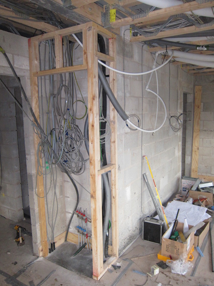 Wooden framework for the electrical cupboard behind the kitchen door