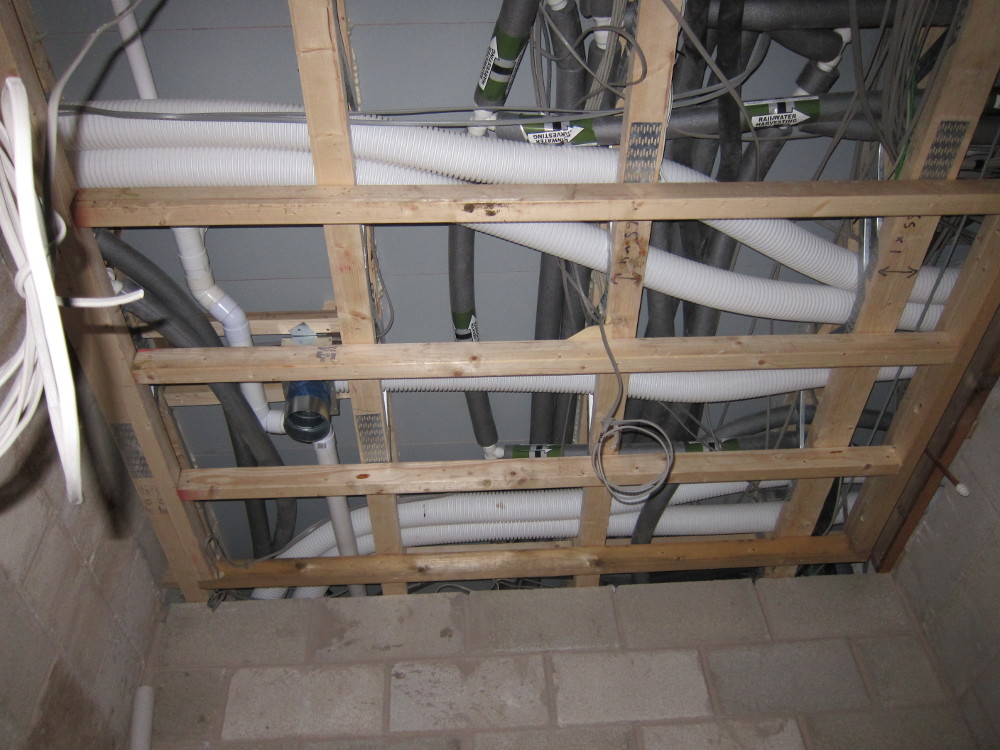 Framework for dropped-ceiling in ground floor shower room
