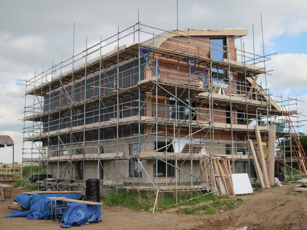 Structured roofing underlay on vertical section of north roof