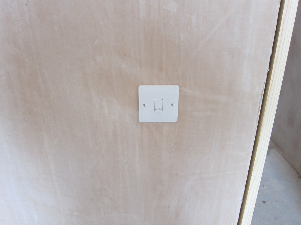 Momentary-action ("Press") light switch in home office
