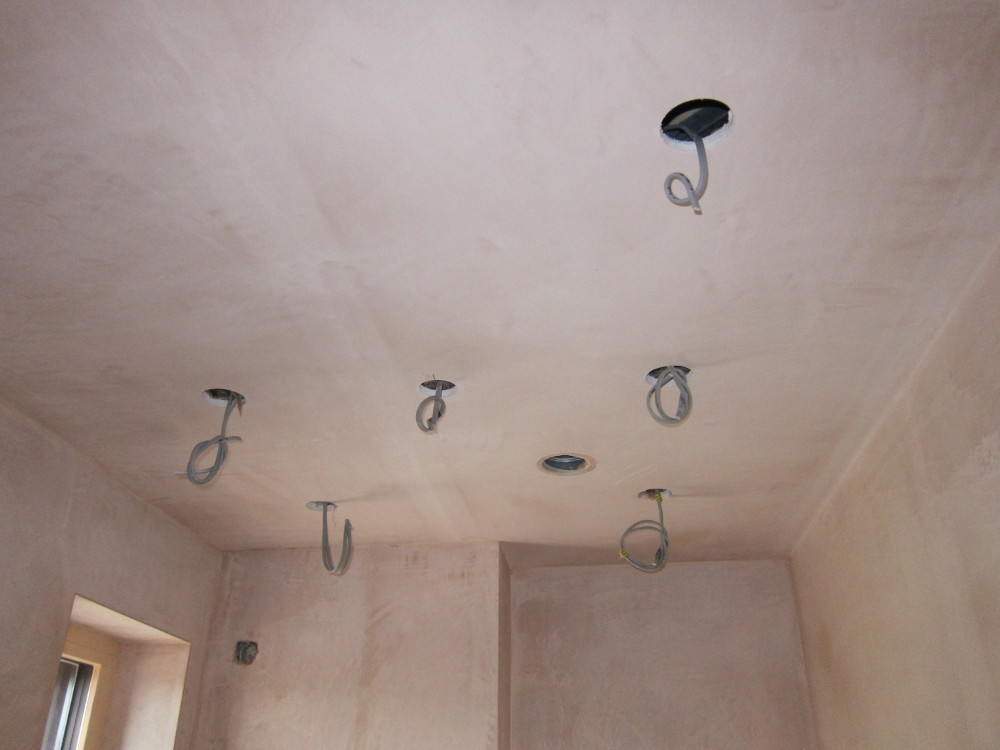 Cut-outs for downlighters and PIR sensor in one of the bathrooms