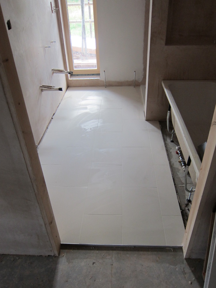 Grouted floor tiles in the Master Bedroom En-Suite