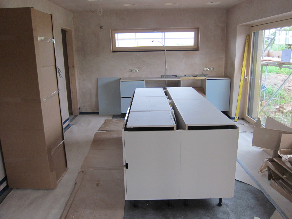 Kitchen island units and sink units beyond