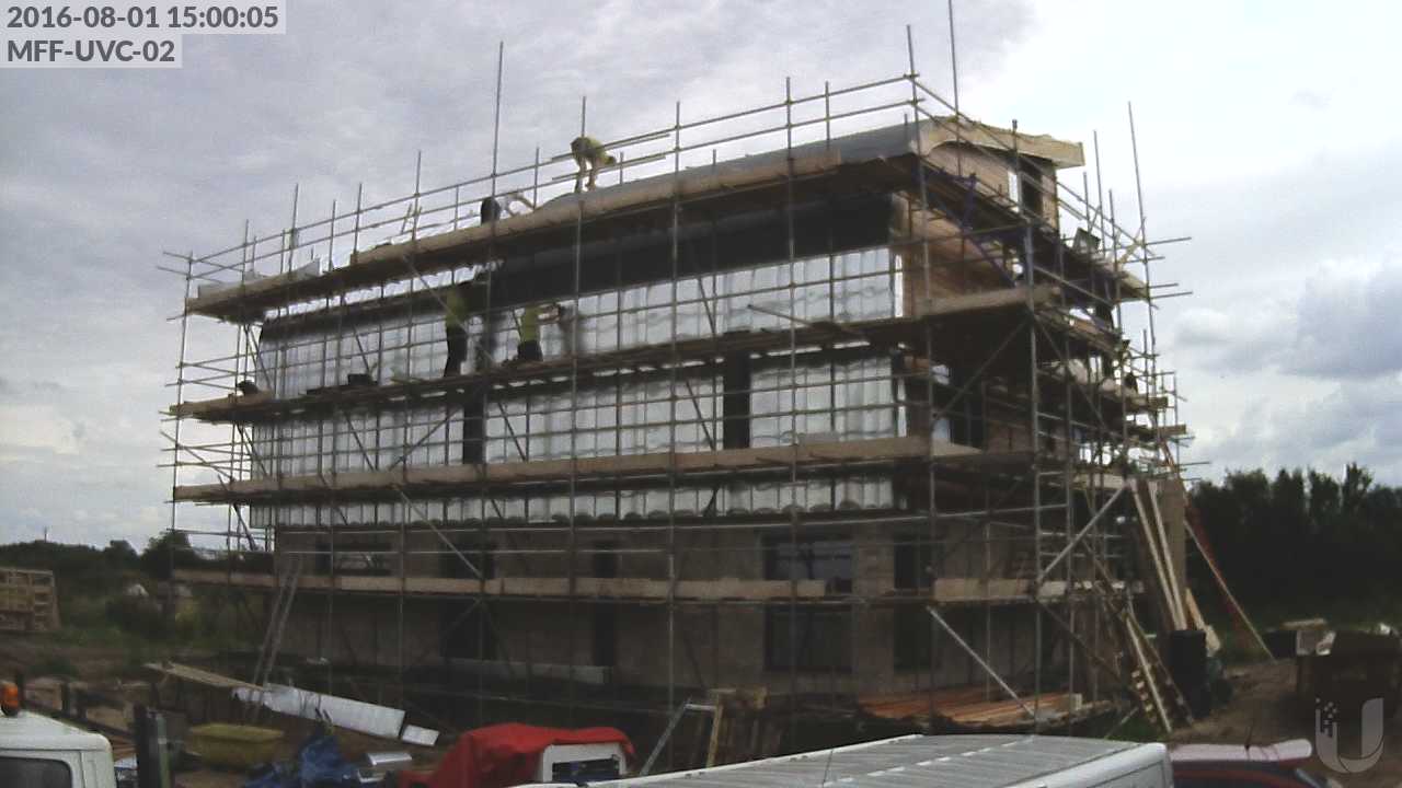 Working on the zinc over the curved section of the north roof