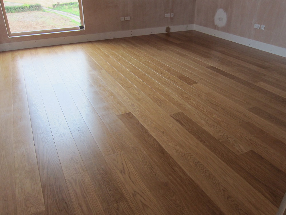 Second coat of oil finish on the oak flooring in the Home Office