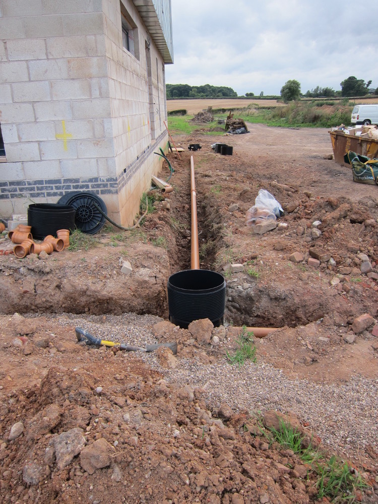 Drains roughly laid at the north-west corner