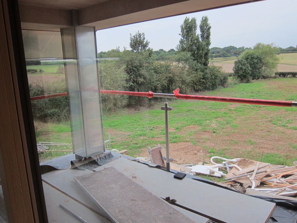 Handrail installed for balcony; just the glass to go