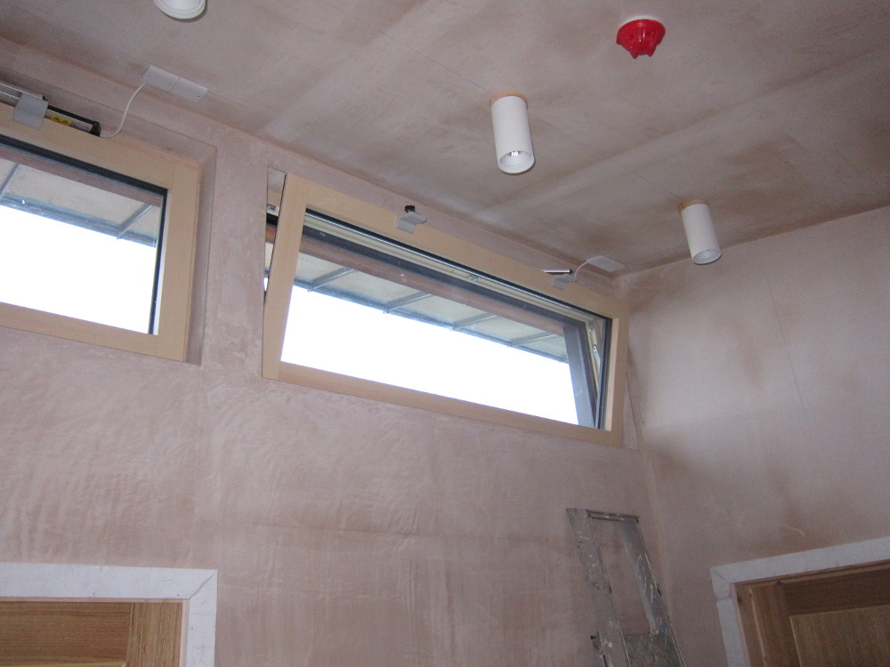 Electric clerestory windows on the second floor