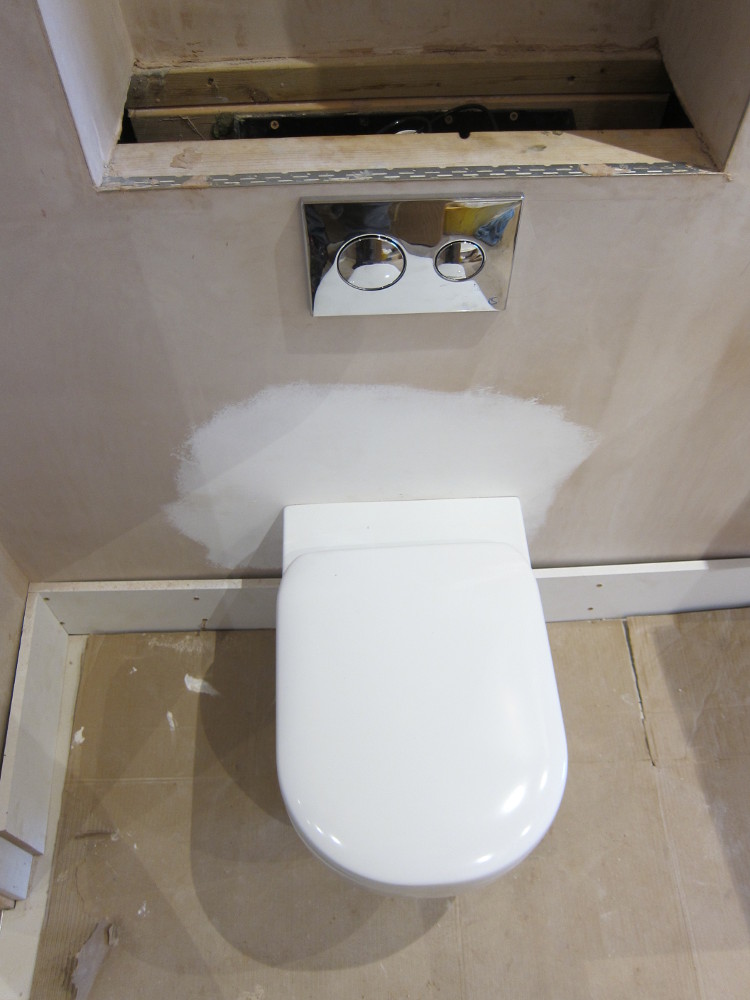 Ideal Standard Playa wall-mounted WC with concealed cistern and dual flush plate