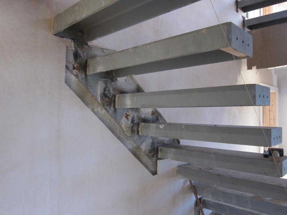 Plaster removed around problem steps on ground-to-first floor staircase