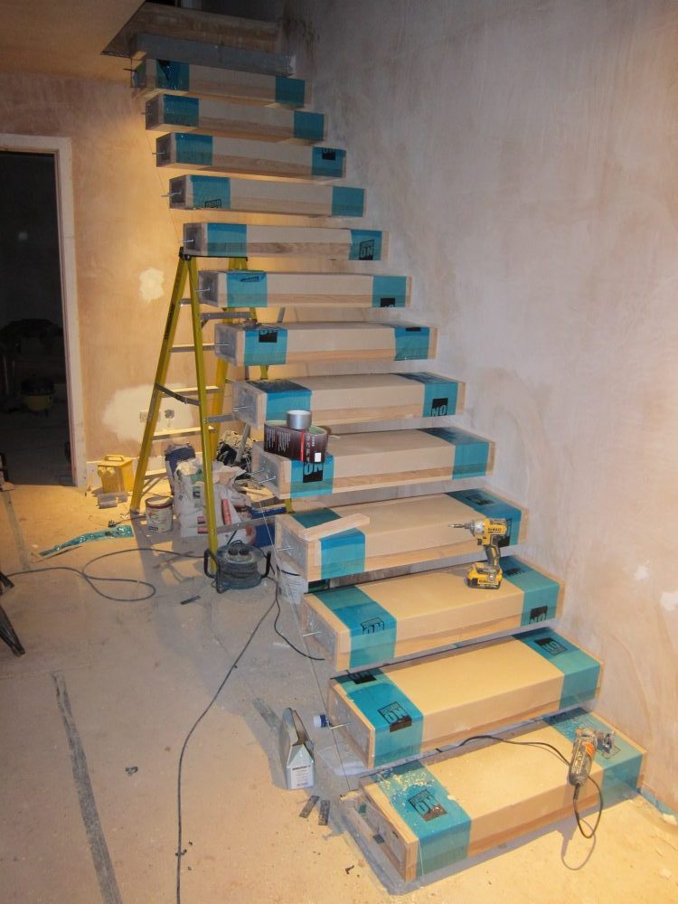 Oak boxes on ground-to-first floor stair treads