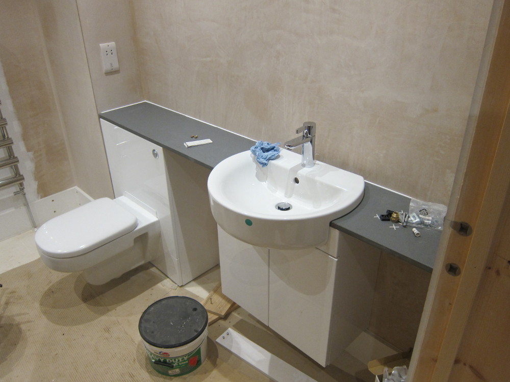 Vanity top and sink installed in First Floor bathroom