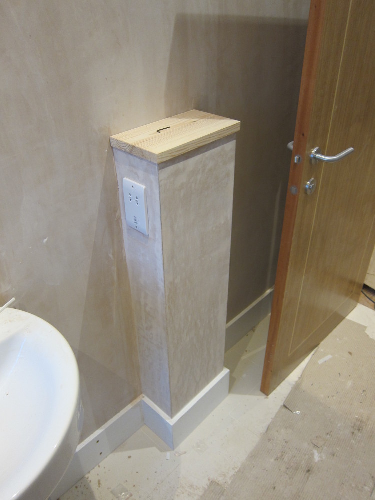 Completed and trimmed boxing around vent pipe in Second Floor bathroom