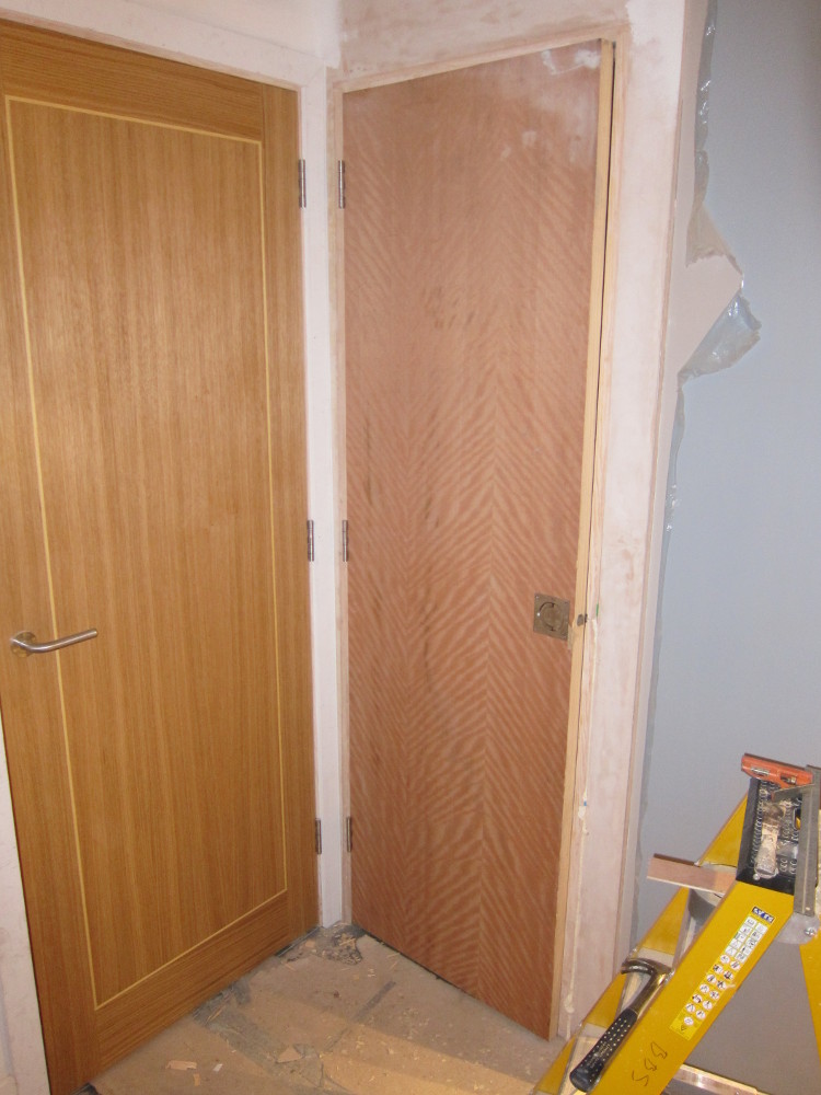 "Secret" door to electrical cabinet in kitchen