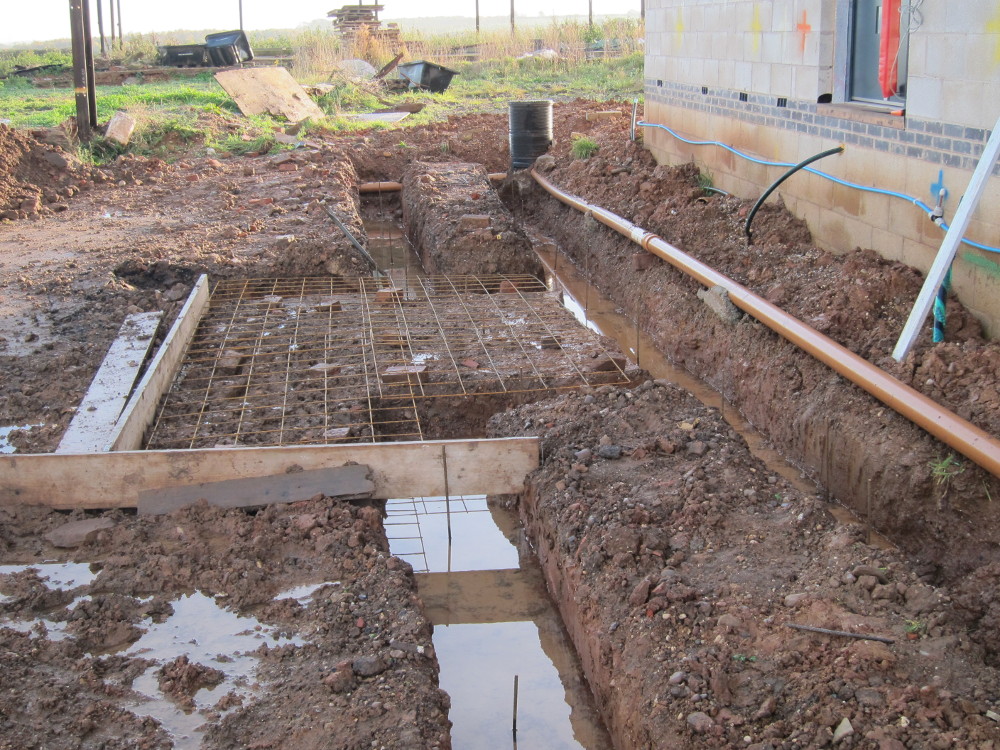 Footings and reinforcing mesh for stair pad ready for concrete